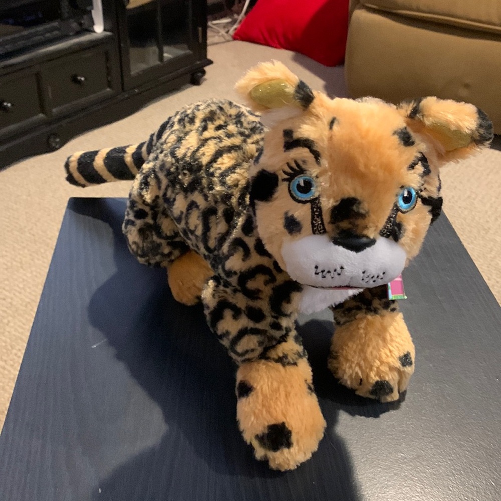 Leopard Girl Scout stuffed animal